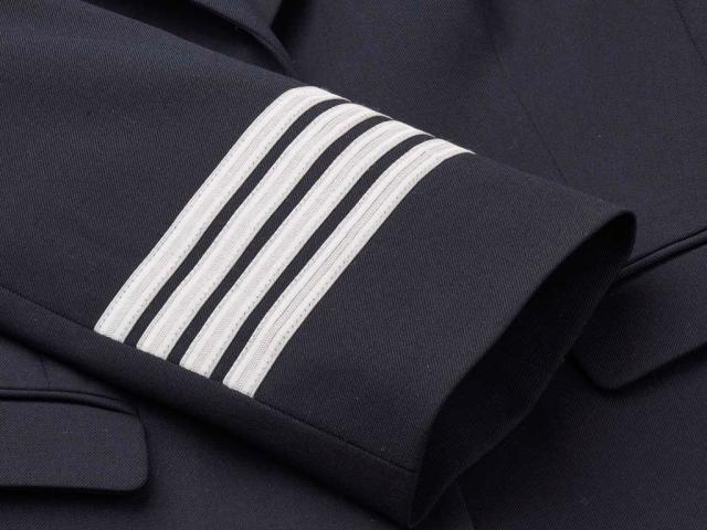 Four silver stripes on jacket